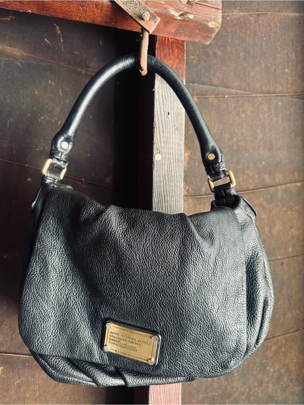 Black Leather Shoulder Bag with Gold Plaque